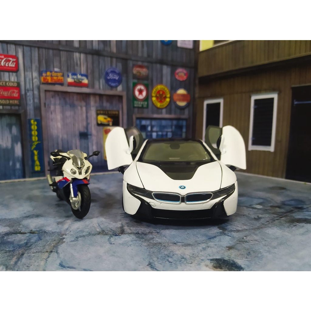 Mô hình xe ô tô siêu xe BMW I8 Hãng Rastar tỉ lệ 1:24 màu trắng, vỏ hợp kim, mở được cửa