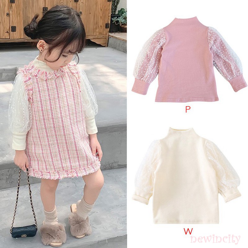 Áo dài tay cổ cao phối lưới họa tiết chấm bi phong cách Hàn Quốc xinh xắn dành cho bé gái