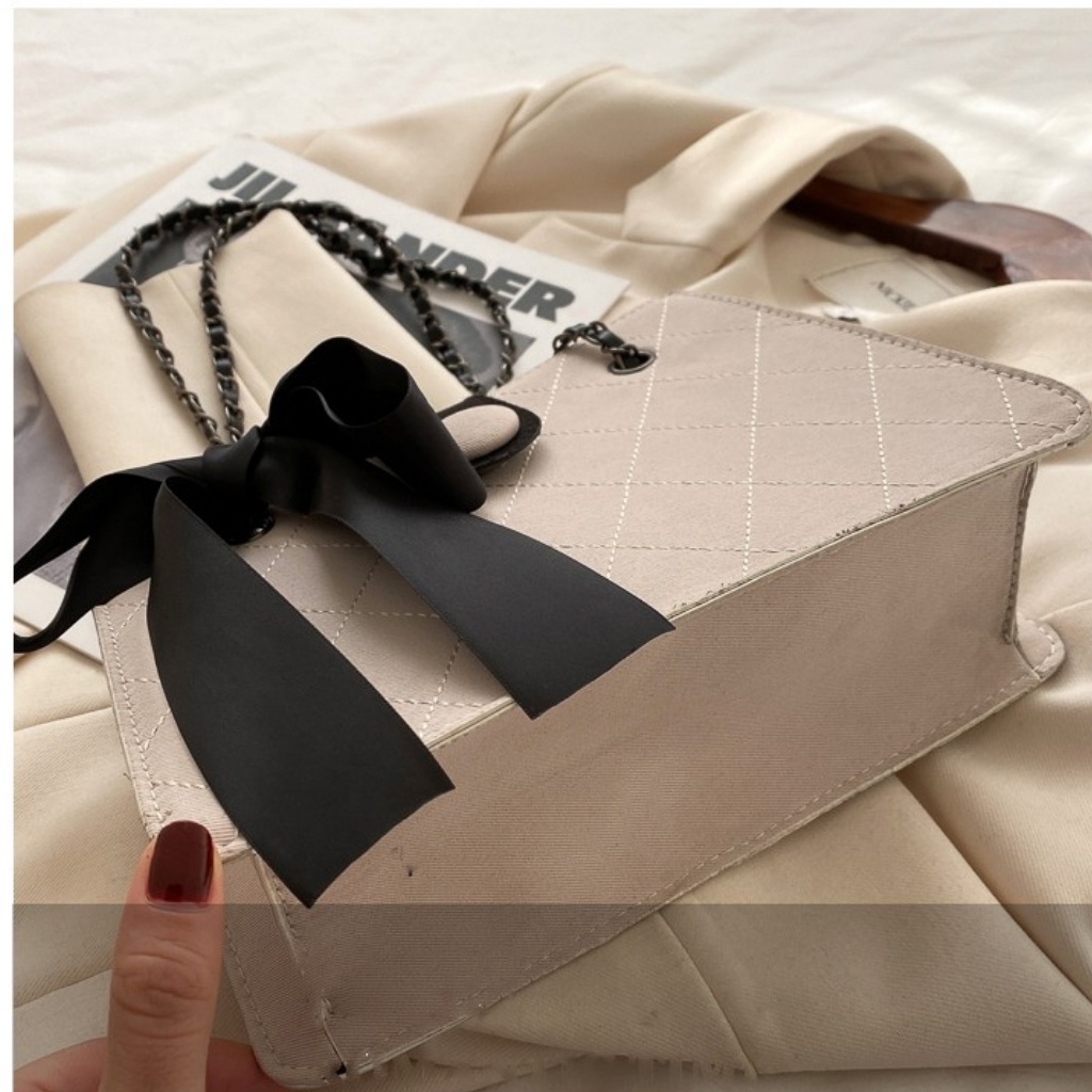 Túi xách nữ mã M04, túi đeo chéo, đeo vai, cúc bấm, thắt nơ đen, hàng quảng châu, chất lượng da cao cấp, đen trắng