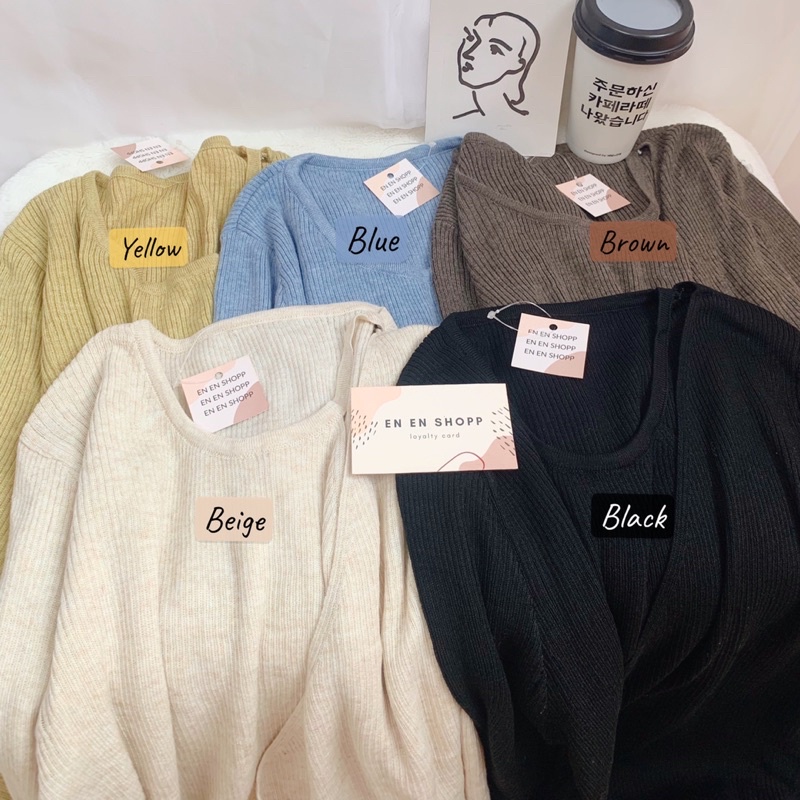 Áo len cài cúc lệch