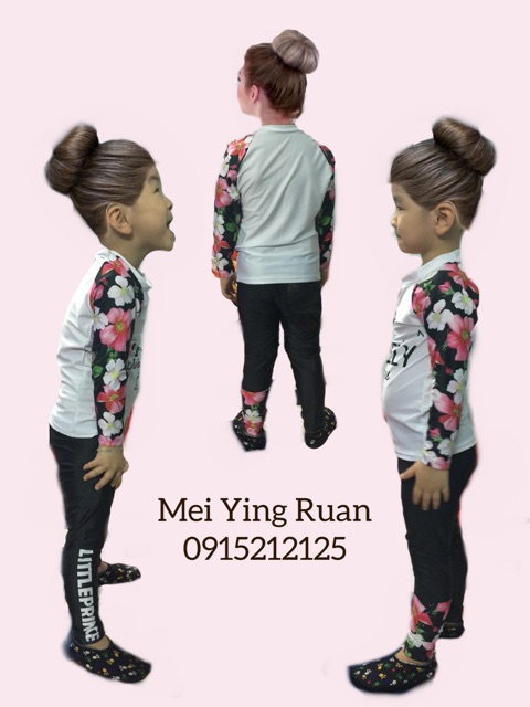 Bộ bơi dài tay hoa trắng và đen | BigBuy360 - bigbuy360.vn