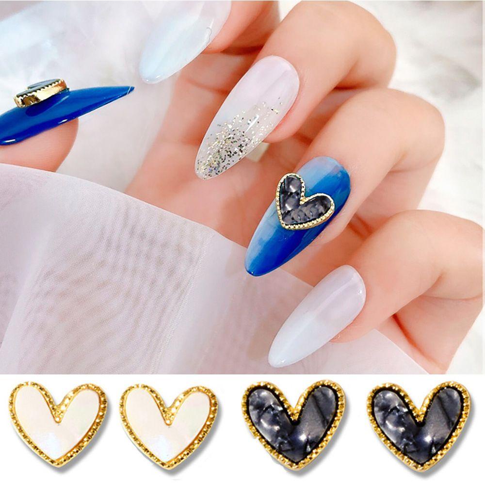 Set 10 Phụ Kiện Trang Trí Móng Tay 3D Bằng Hợp Kim Hình Trái Tim Thời Trang
