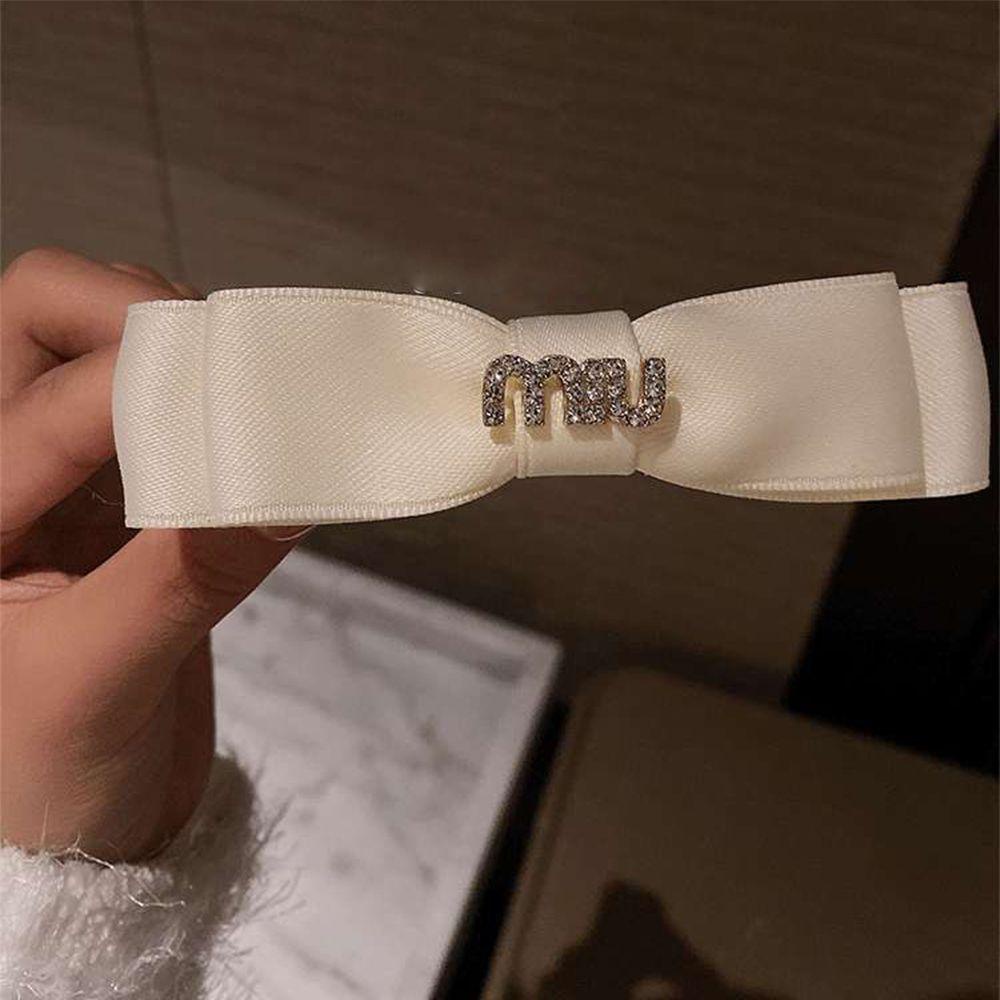 Kẹp Tóc Nơ In Chữ Miu Màu Đen Phong Cách Pháp Độc Đáo Cho Nữ