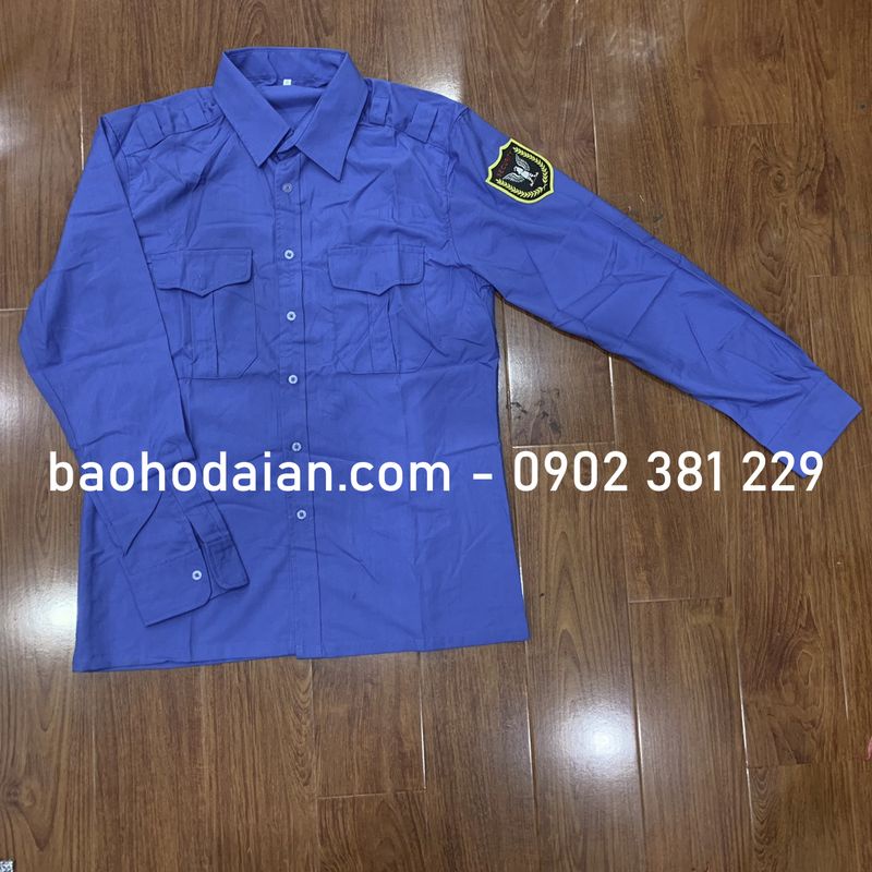Áo bảo vệ vải Kate Mỹ tay dài màu xanh nước biển logo tay