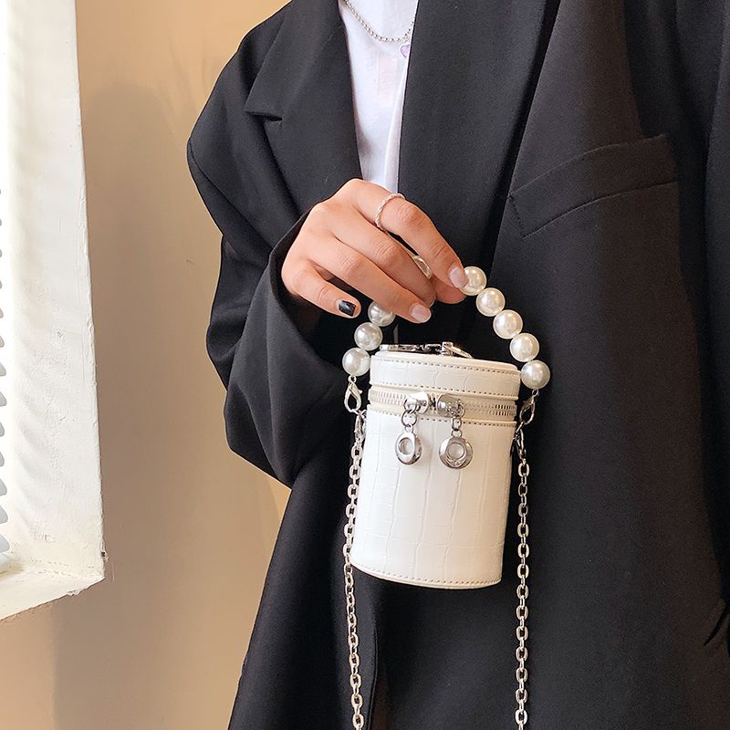 Túi sách, túi trụ da sần nhỏ xinh