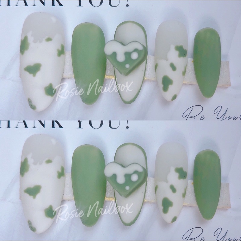 Móng úp màu xanh phối họa tiết bò sữa và tim nhẹ nhàng kèm keo và dũa cho nàng