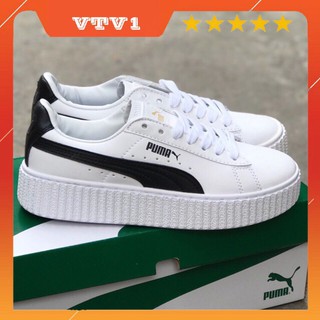 Ảnh shop chụp cam thường Giày thể thao màu trắng viền đen đế cao của nữ