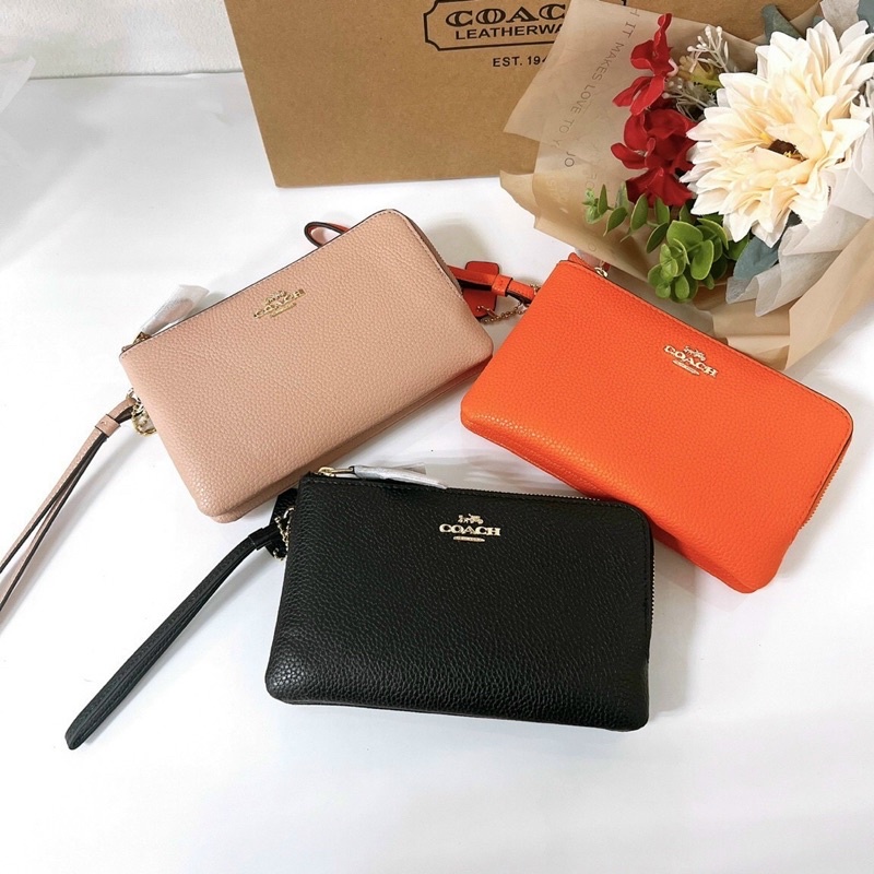 Ví cầm tay nữ Coach da thật, màu trơn, size nhỡ, 2 ngăn khoá tiện dụng