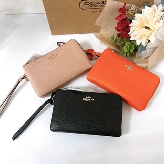 Ví cầm tay nữ Coach da thật, màu trơn, size nhỡ, 2 ngăn khoá tiện dụng