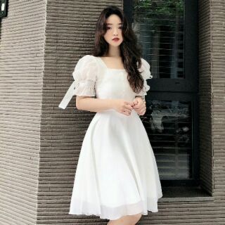 Đầm trắng xòe tay nơ