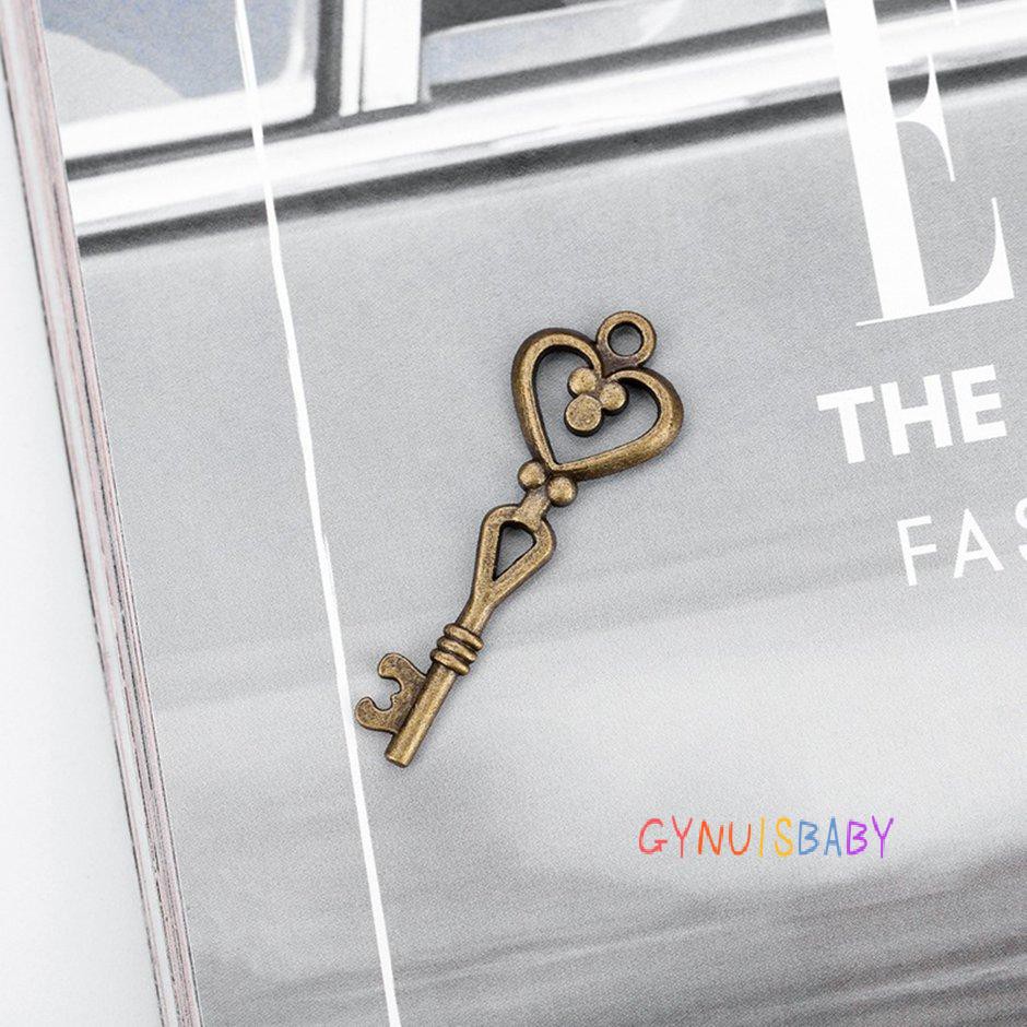 Mặt Dây Chuyền Hình Chìa Khóa Chất Liệu Hợp Kim Đồng