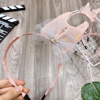 Bờm nơ lệch cho bé gái