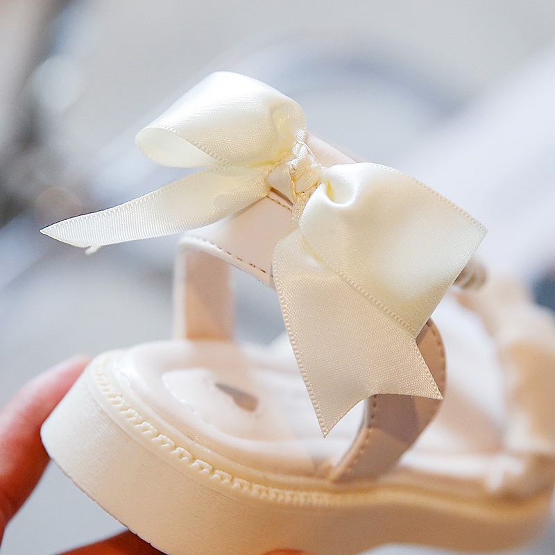 Sandal Đế Mềm Đính Nơ Và Dây Cột Ngọc Trai Thời Trang 2022 Cho Bé Gái Sandal ngọc bé gái