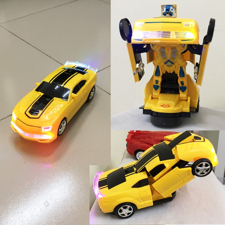 Xe biến hình robot, có nhạc đèn chạy đụng vật cản tự đổi hướng. Xe màu vàng 8986