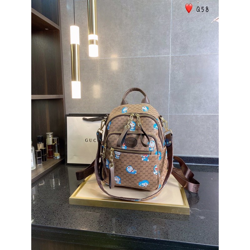 Balo thời trang da thật cao cấp GG GC Gucci thiết kế họa tiết logo và hình Doreamon siêu hot năm nay