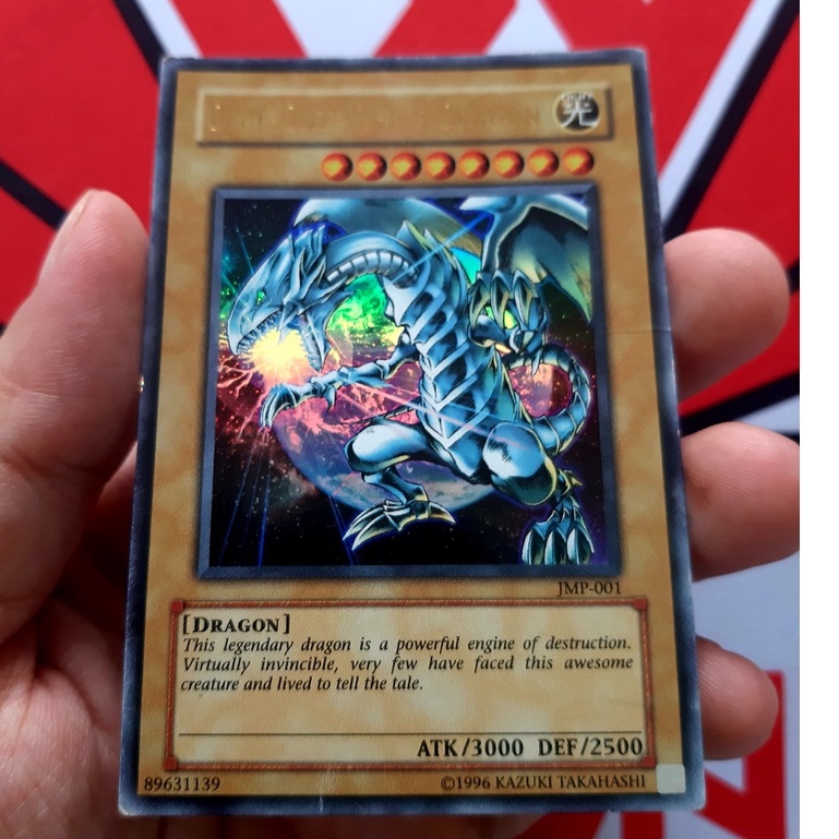 Thẻ Bài Yugioh TCG Damged Blue-Eyes White Dragon - JMP-001 - Ultra Rare