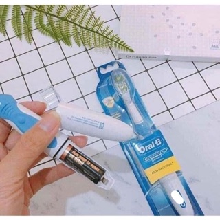 Bàn chải pin Oral B cross action power Dual Clean