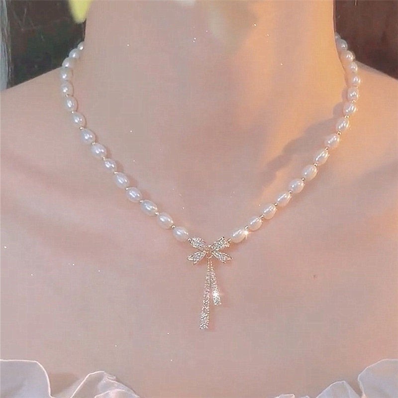Dây Chuyền Mặt Nơ Đính Ngọc Trai Thời Trang