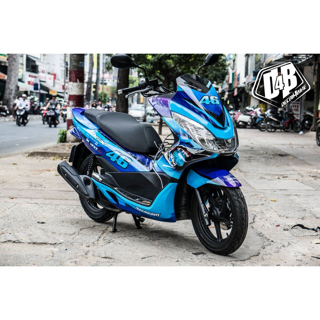 Tem trùm xe PCX Crazy Shark