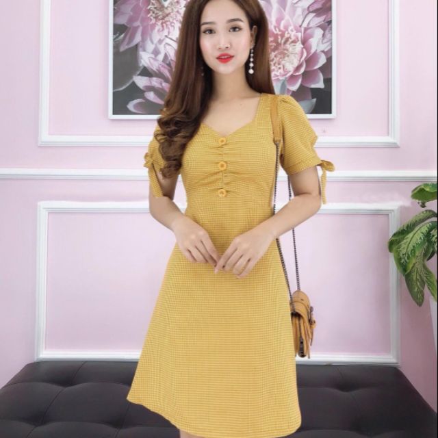 Đầm caro tay nơ