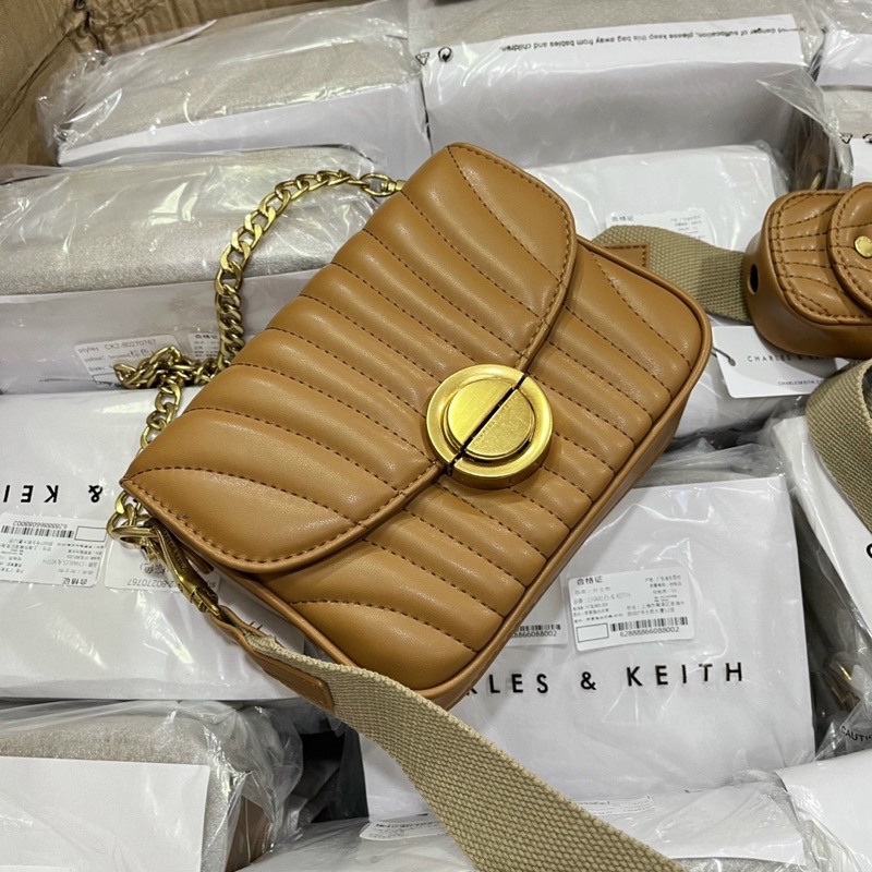 TÚI CNK CHẦN AURORA METALLIC ACCENT