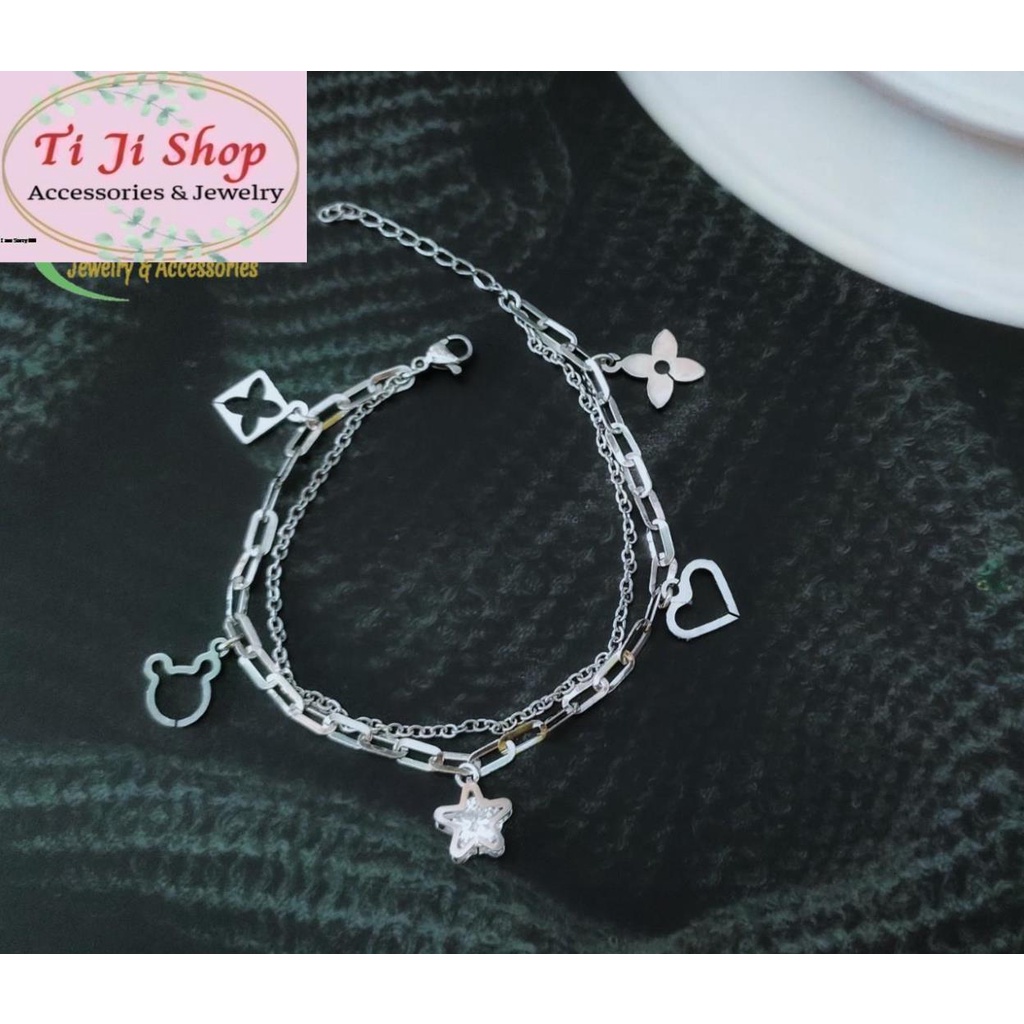 LẮC TAY NỮ INOX  2 TẦNG GẮN PHỤ KIỆN NGÔI SAO ĐÍNH ĐÁ ZICON