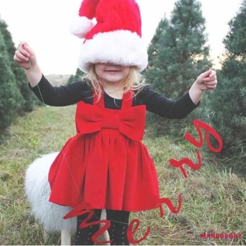 Đầm xòe phong cách công chúa phối nơ đỏ phong cách Giáng sinh mới nhất cho bé gái