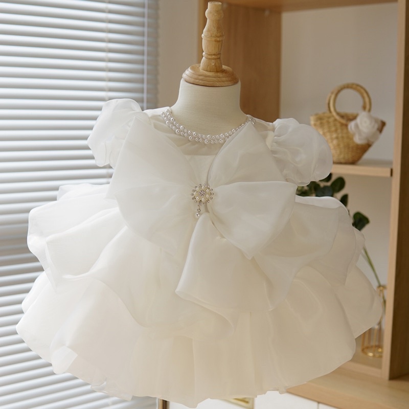 Đầm công chúa cho bé gái, váy đi tiệc cho bé từ 8-18kg màu trắng/hồng có nơ to cực xinh - TRASUAOI D002