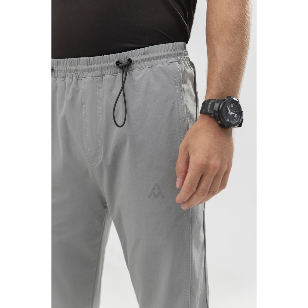 Quần Gió thể thao nam AM QGM211 Sport1 Chất Liệu Mềm Mại, Không Thấm Nước, Không Nhăn