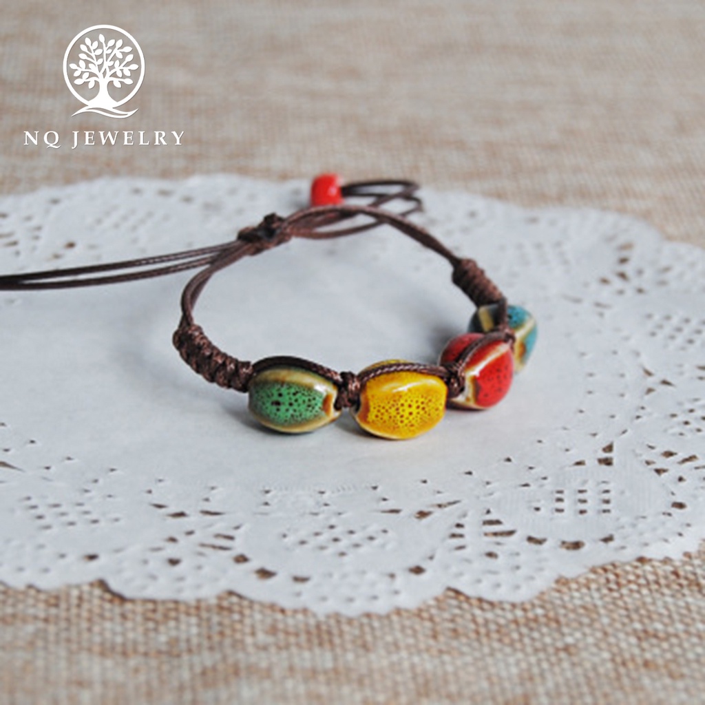 Vòng tay kết dây sáp hạt gốm sứ - NQ Jewelry