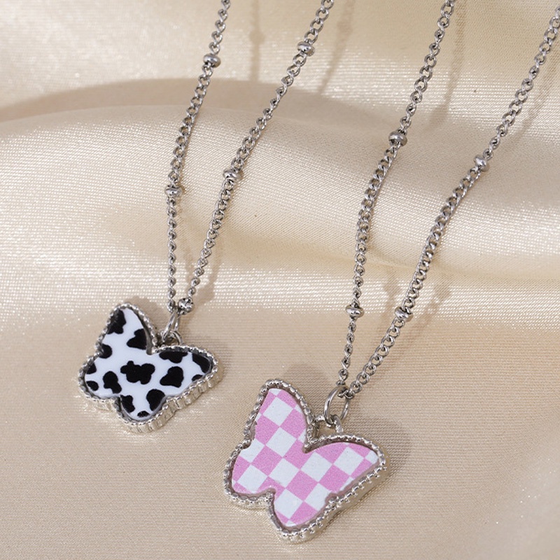 1 Vòng Cổ Choker Màu Trắng / Đen Phối Mặt Hình Bướm / Bò Sữa / Hình Học Thời Trang Cho Nữ