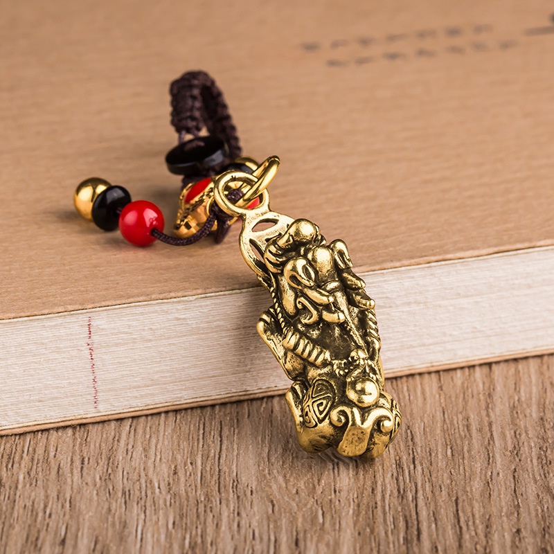 Móc khóa ngũ hoàng hình con tỳ hưu ngậm xu , chất liệu đồng thau bền đẹp.