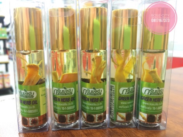 Dầu lăn Nhân Sâm Green her oil Có nhân sâm bên trong chai dầu