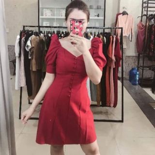 Đầm tay phồng nút bọc