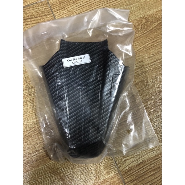 Ốp chụp đèn soi biển số xe AB Air blade đời 2022->2025 (nhựa ABS các bon cao cấp )