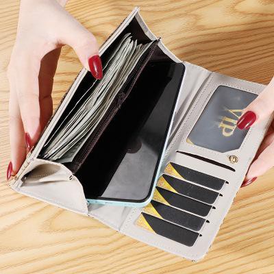 Ví nữ cầm tay sang trọng, nhiều ngăn tiện dụng HX0051