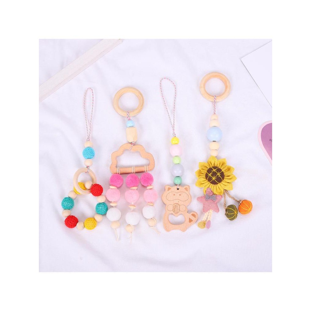 4 Đồ chơi mọc răng bằng gỗ treo xe đẩy em bé