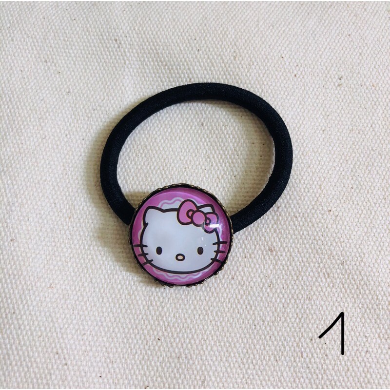 Cột tóc Hello Kitty với huy hiệu bằng đồng cực đẹp và chanh xả
