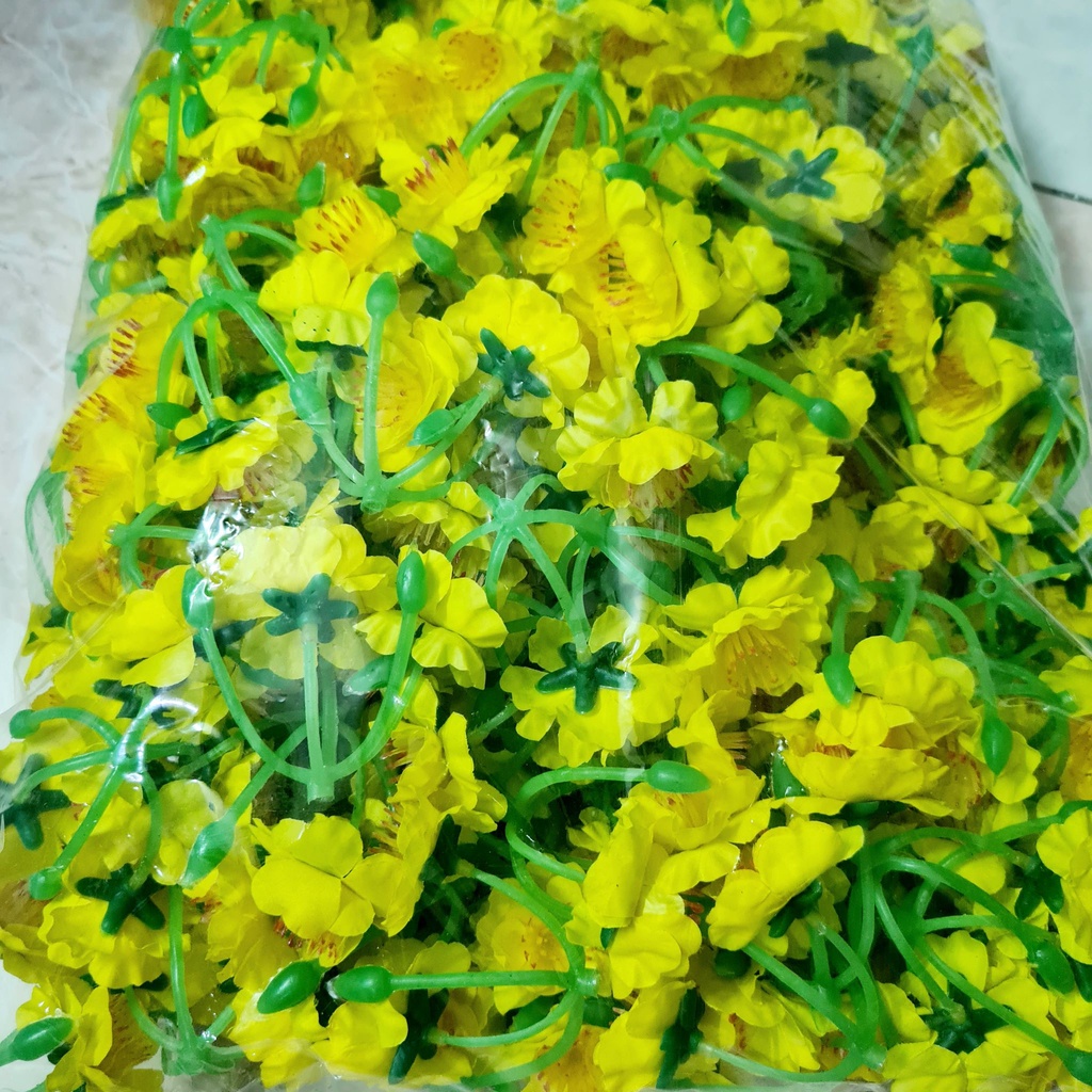 Sĩ 1 kg bông mai , bông đào giả trang tri tết có kẽm lá