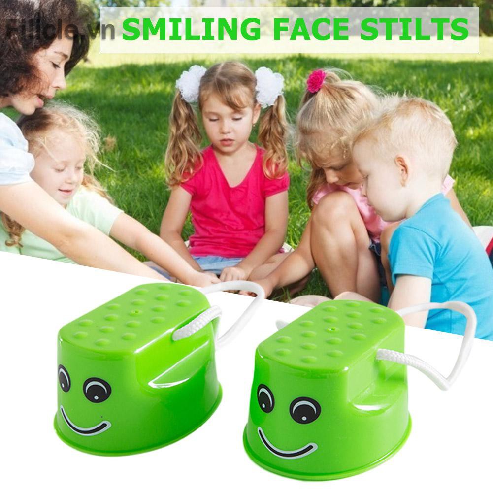 Đồ chơi 2pcs Jumping Stilts Smile Face Walk Stilt Jump Kids Outdoor Fun Sports Toy