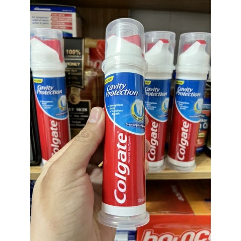 Kem đánh răng Colgate Optic White Renewal 116g và dạng ống xịt Cavity Protection 100g