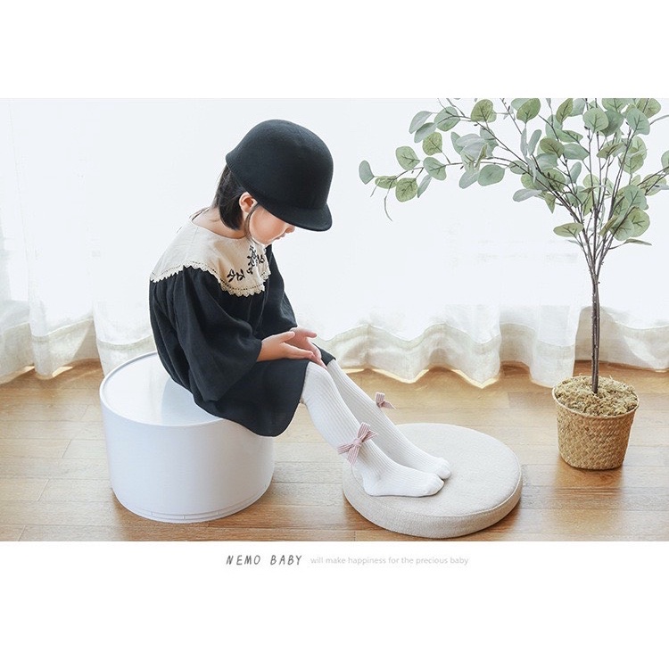 Quần tất len trơn nhiều màu đính nơ to bé gái