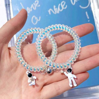 Vòng tay cặp đôi kiểu lò xo mặt đính hình phi hành gia dễ thương xinh xắn