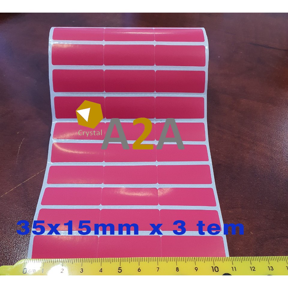 Giấy decal in tem - mã vạch 35x15mm x 50m màu hồng đậm