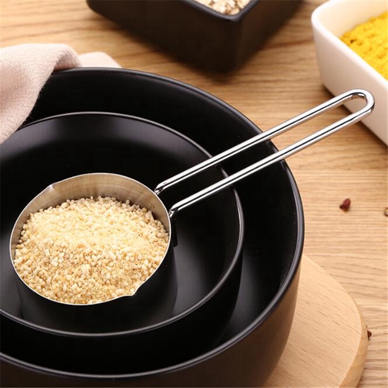 Set 4 cốc đo lường cán dài bằng inox dùng làm bánh