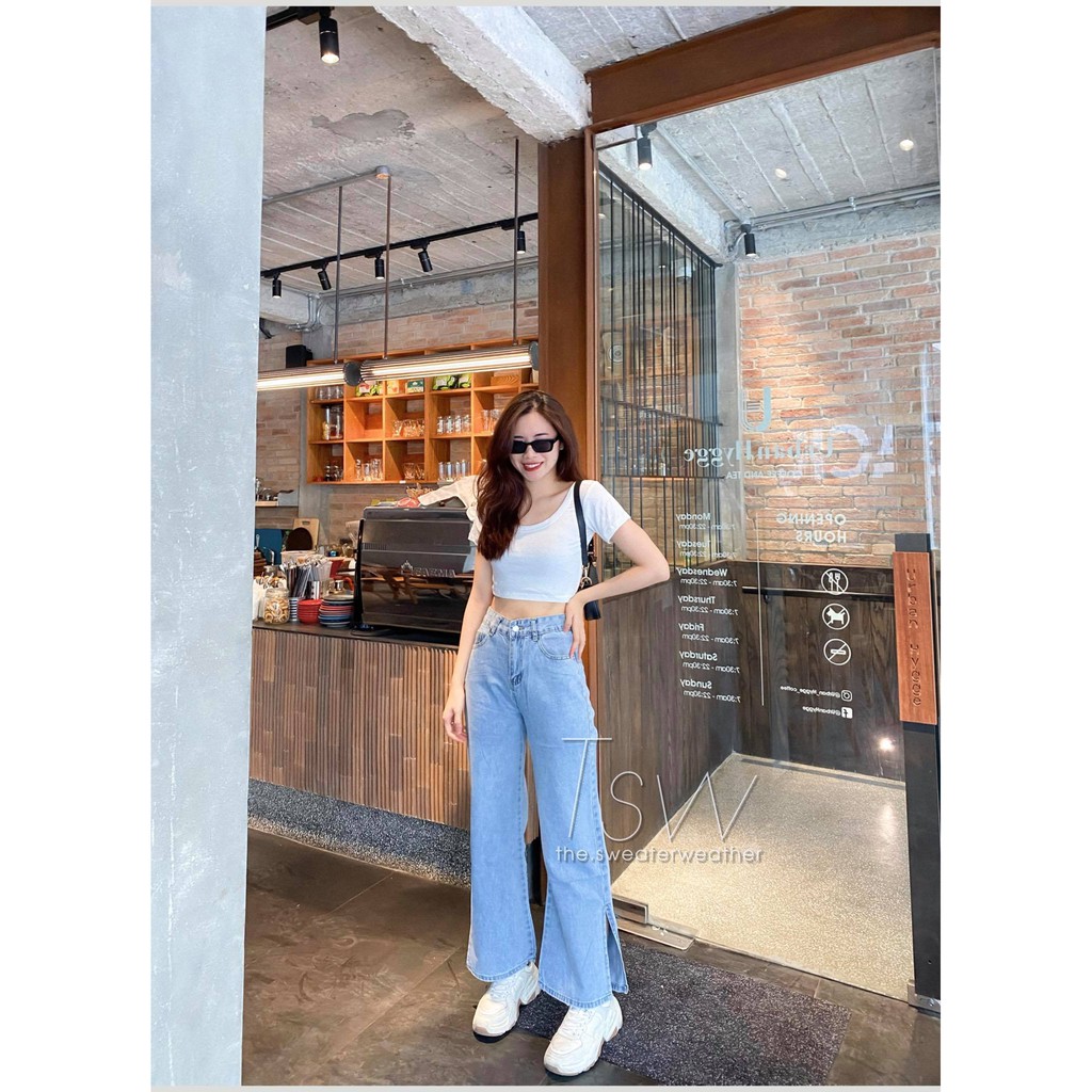 Quần jeans suông xẻ gấu