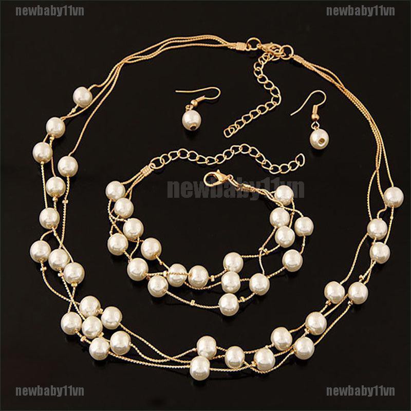 Bộ dây chuyền bông tai và vòng tay mạ bạc đính ngọc trai nhân tạo thời trang
