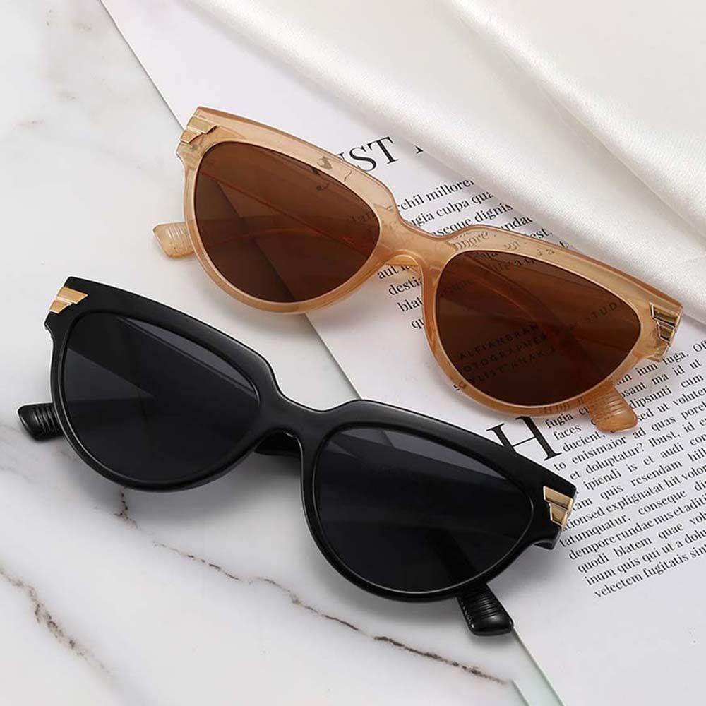 Kính Mát Mắt Mèo Gọng Kim Loại Chống Tia UV Họa Tiết Da Báo Sang Trọng