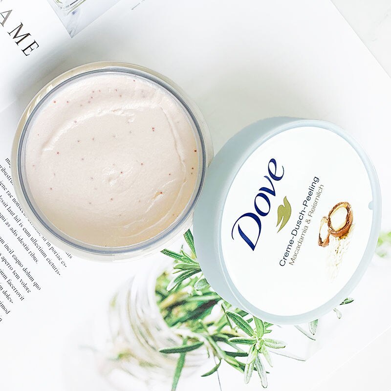 Kem Dove tẩy tế bào chết chiết xuất Macadamia / trái cây làm trắng và trẻ hóa 298g