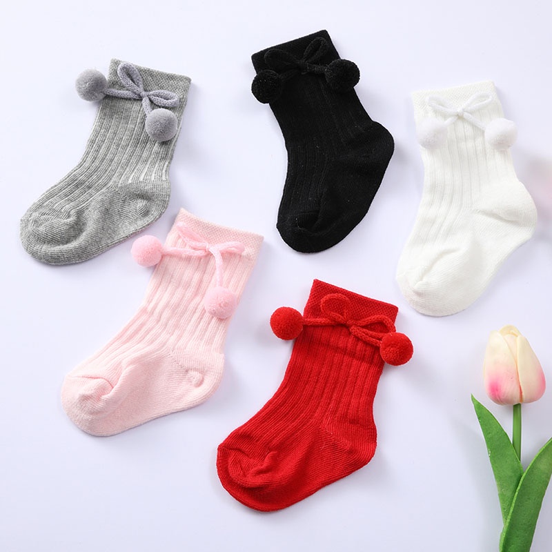 Đôi vớ màu trơn đính bóng lông dễ thương cho bé gái